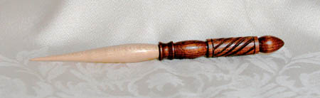Hand carved, Walnut/Maple, 0.4" D 5.5"" L, $48.00 