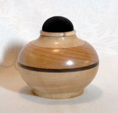Maple with Walnut stripe, round footed style, 3.5" D x 2.5" H, $75.00 